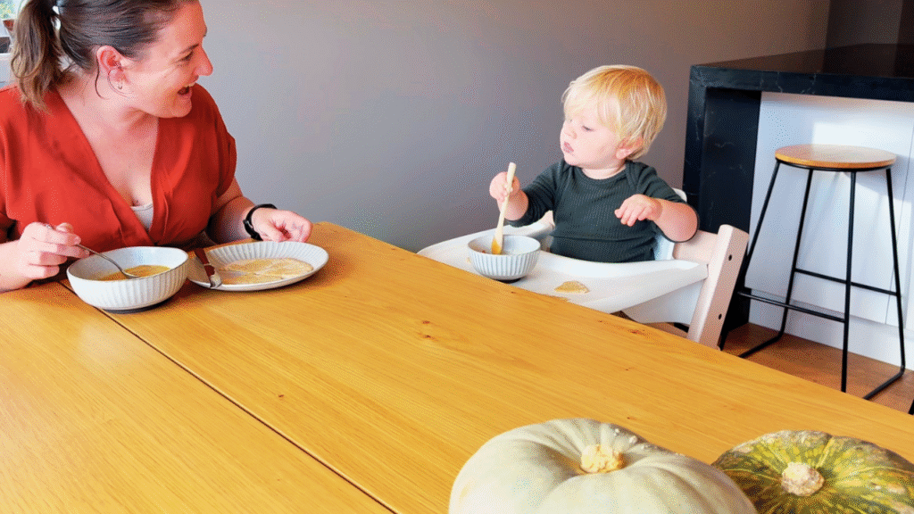 mom and toddler eating autumn lunch together