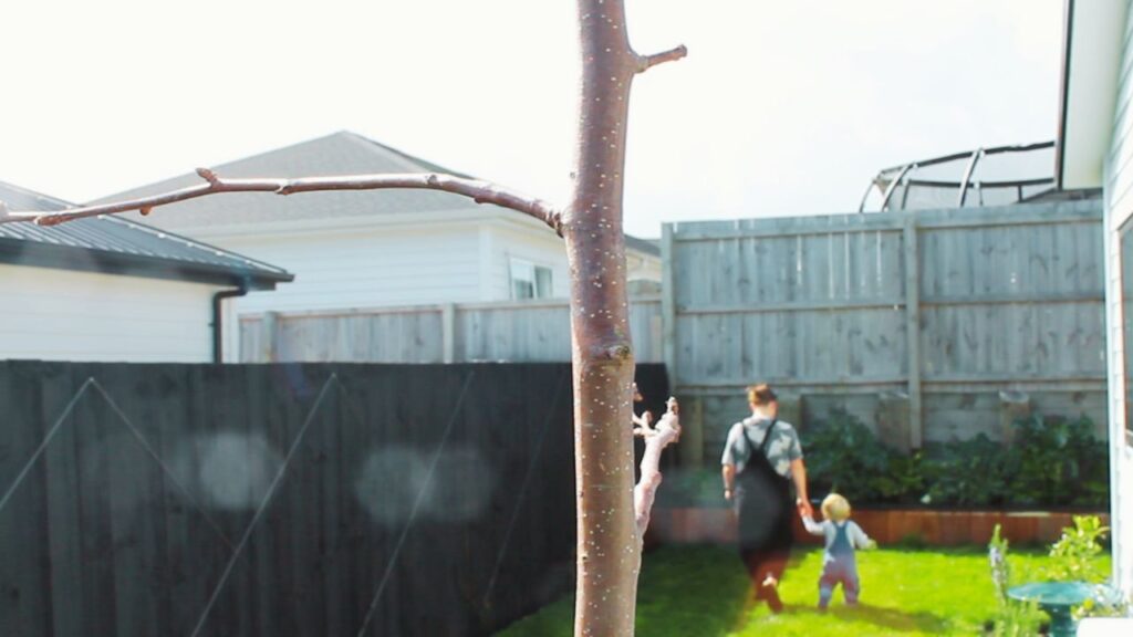 mom and toddler spending time together in the garden