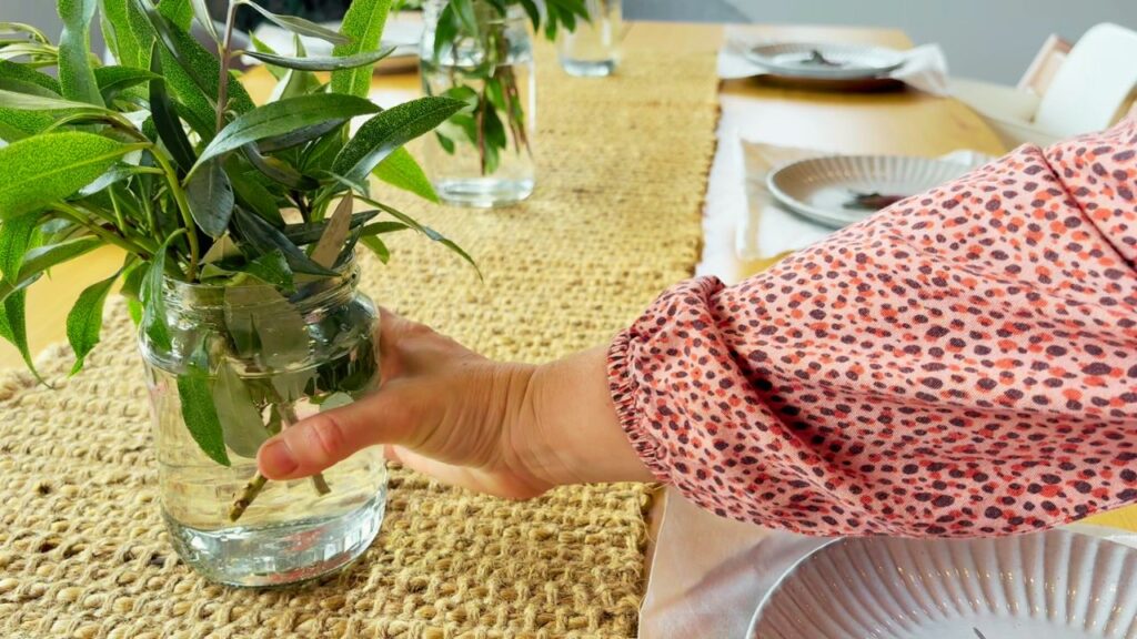 mom decorating table for the holidays
