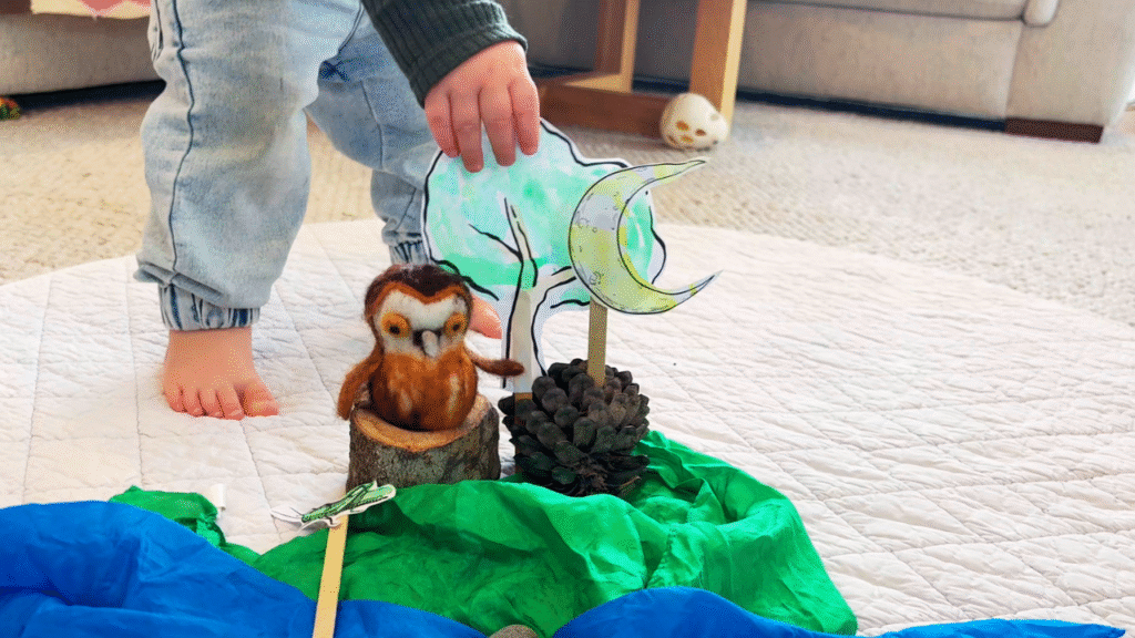 toddler touching waldorf inspired props for story telling