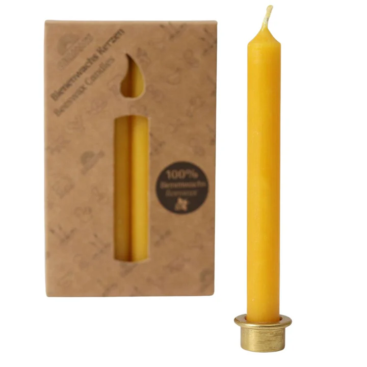 Beeswax candles and brass holders