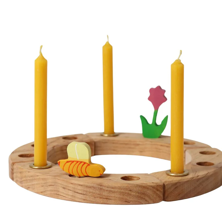 Beeswax candles and brass holders