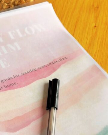 Family Flow Rhythm Guide on the table used for reflecting on morning rhythm with a toddler